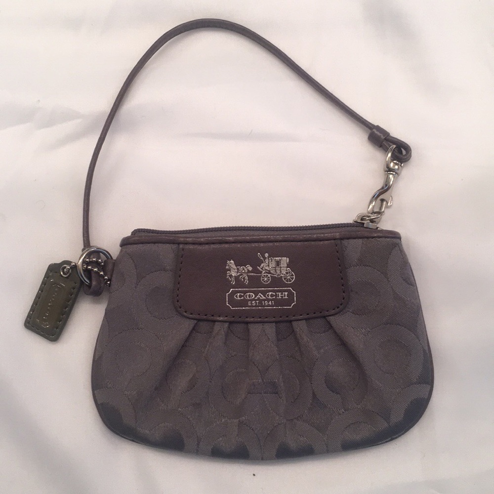 Coach clutch/ wristlets